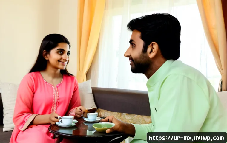 Home 17 비폭력 커뮤니케이션과 감정 표현 - Photorealistic Pakistani family conversation in a bright, tidy living room, two adults seated respec...
